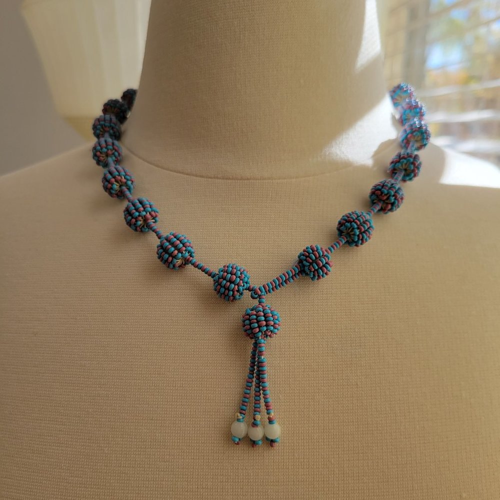 A vant garde Antique Beaded Glass Art Deco Artisan Seed Glass Necklace blue pink